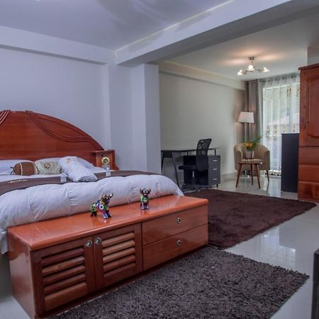 Jk Guzman Suite Hotel Чальюауачо Экстерьер фото