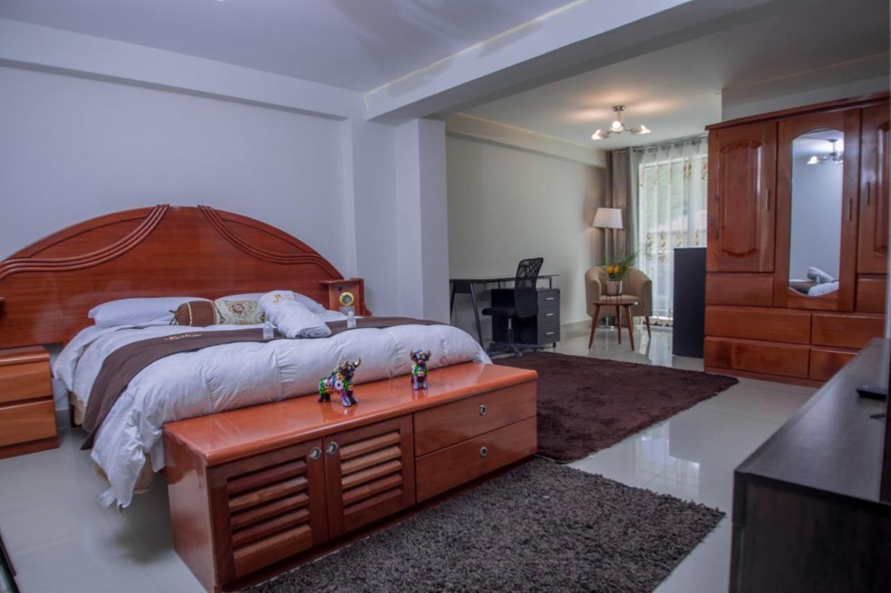 Jk Guzman Suite Hotel Чальюауачо Экстерьер фото