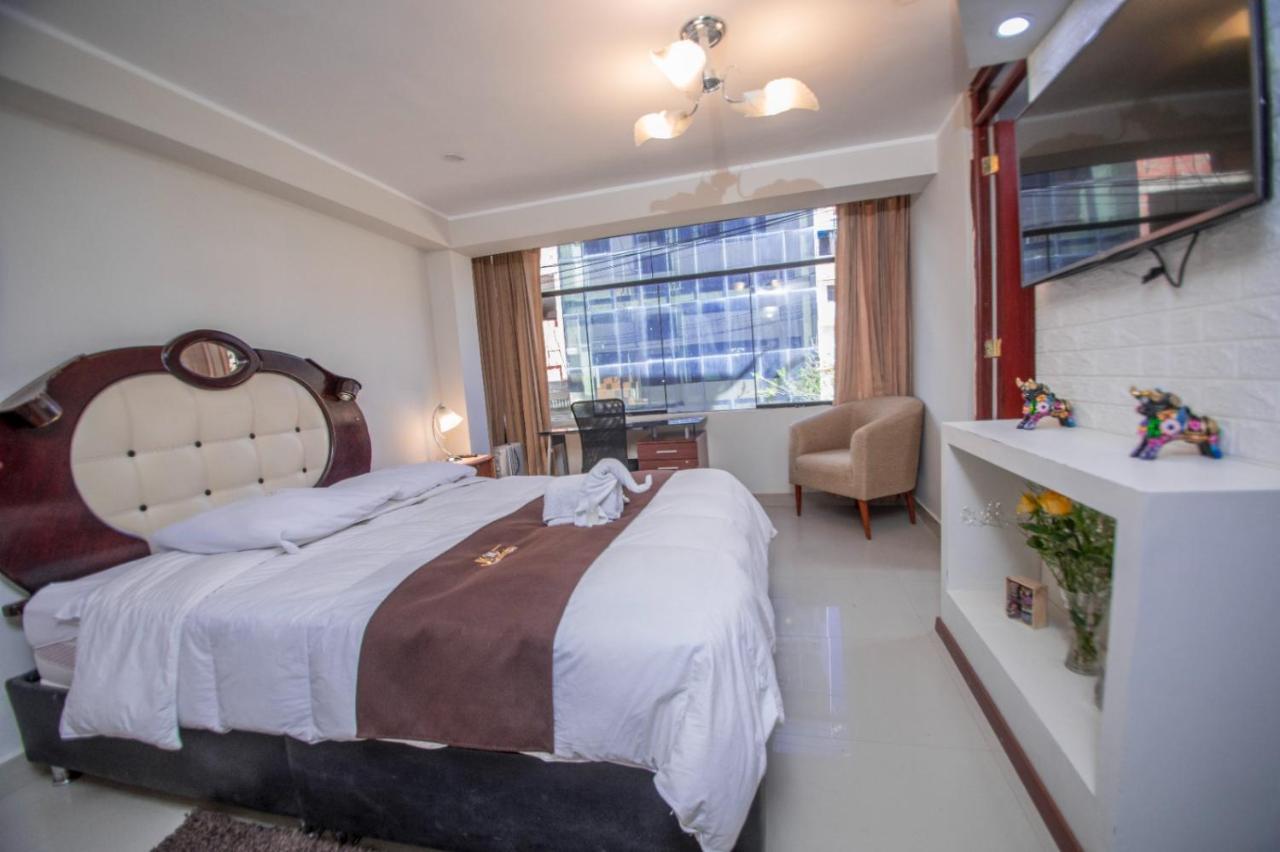 Jk Guzman Suite Hotel Чальюауачо Экстерьер фото