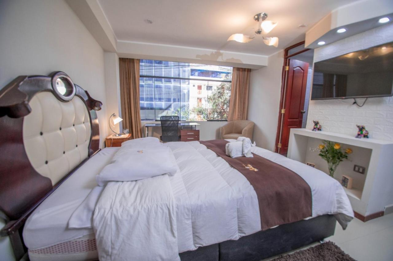 Jk Guzman Suite Hotel Чальюауачо Экстерьер фото